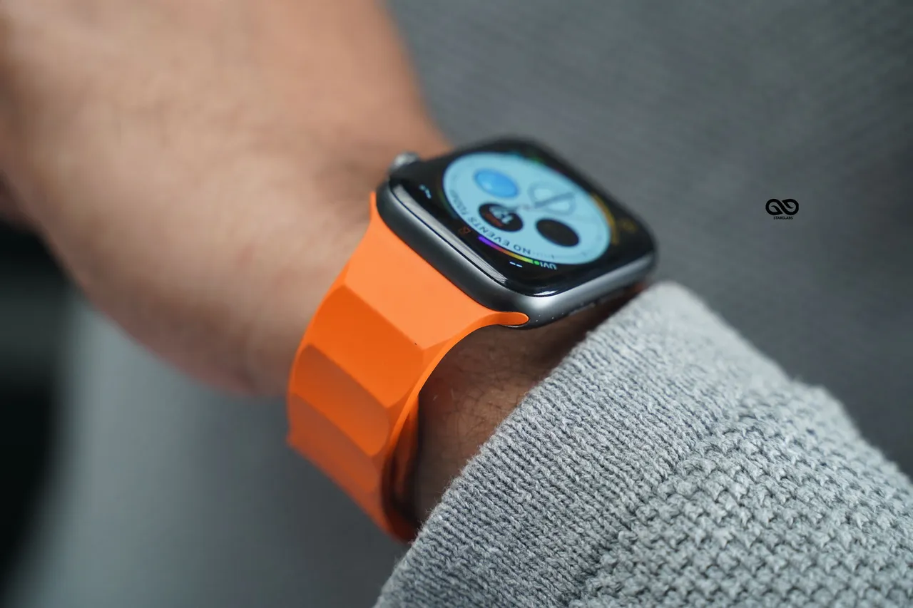 Casual watch band on Apple watch with an orange strap